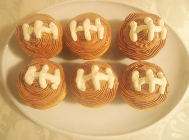 Football themed cupcakes - perfect for celebrating the start of the season or watching the Super Bowl.
