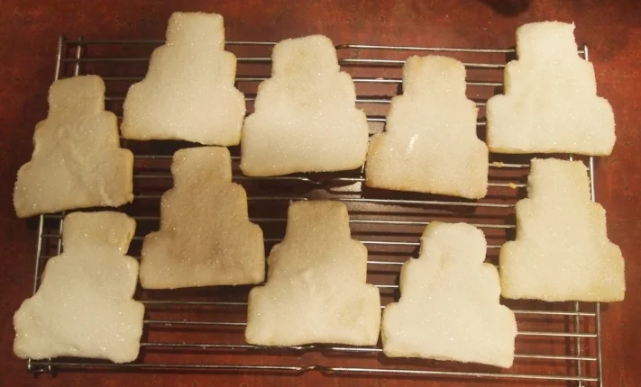 New and improved wedding cake sugar cookies, with royal icing and sugar sprinkles.