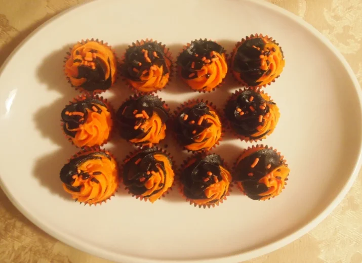 Mini orange velvet cupcakes - also with new swirled icing.