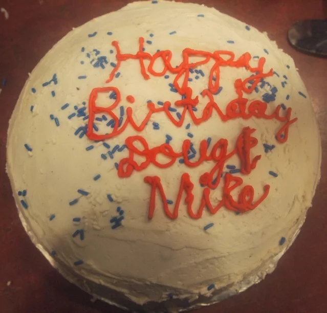 Triple layer cake but with a twist: vanilla on top chocolate on the bottom with peanut butter in the center.