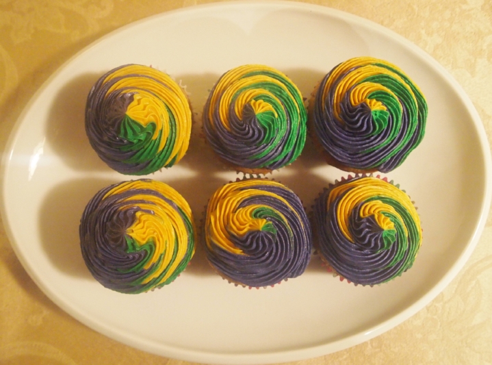 Buttered Rum cupcakes - with swirled colors of Mardi Gras.