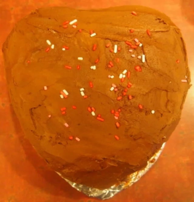 Celebrate Valentine's Day with this heart-shaped vanilla cake with a cherry filling.Price: $12.00