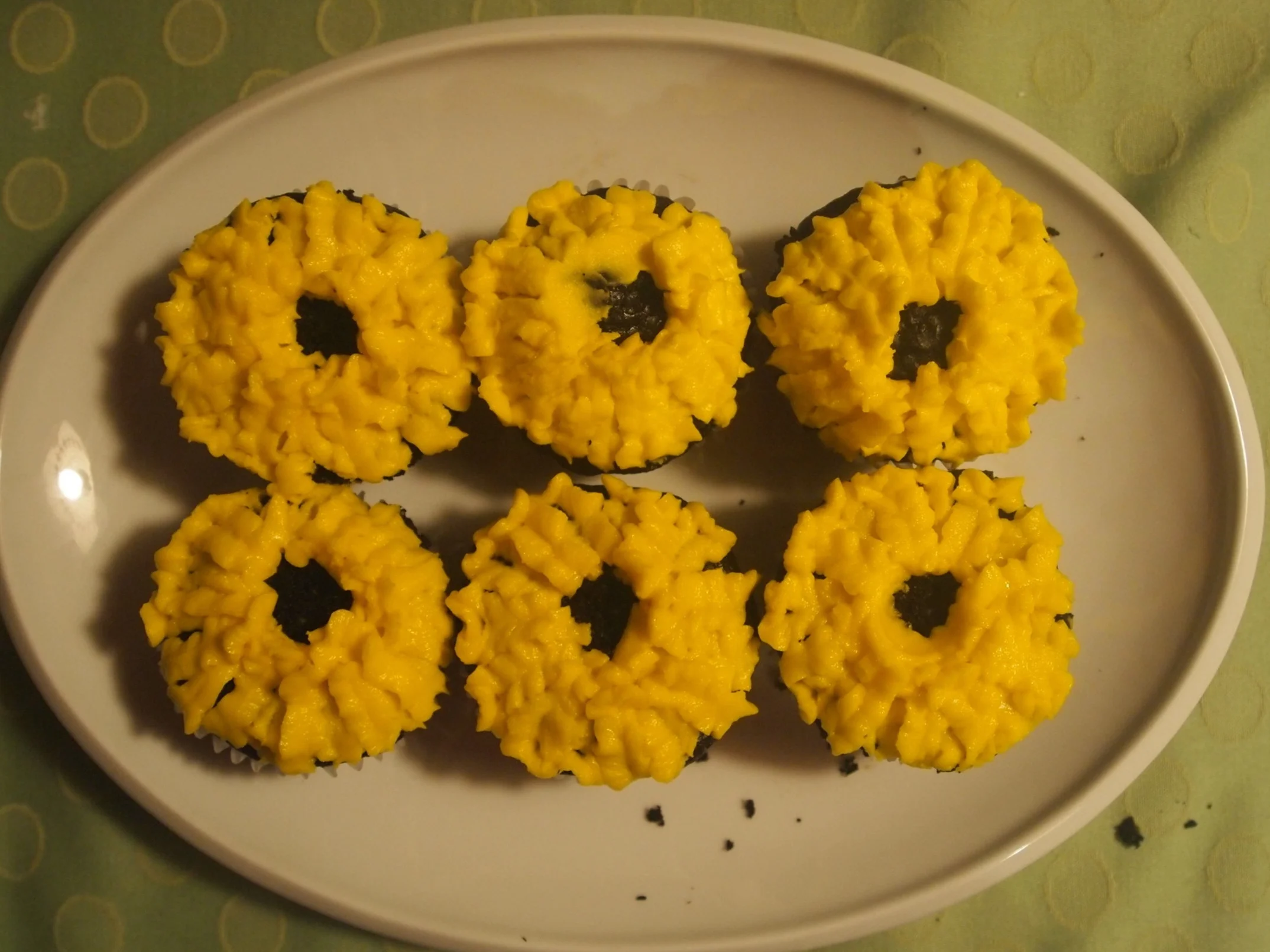 Chocolate with sunflower icing designs.