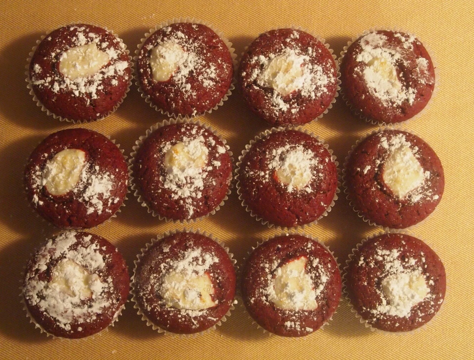 Red Velvet w/ cream cheese center and topped with powdered sugar.