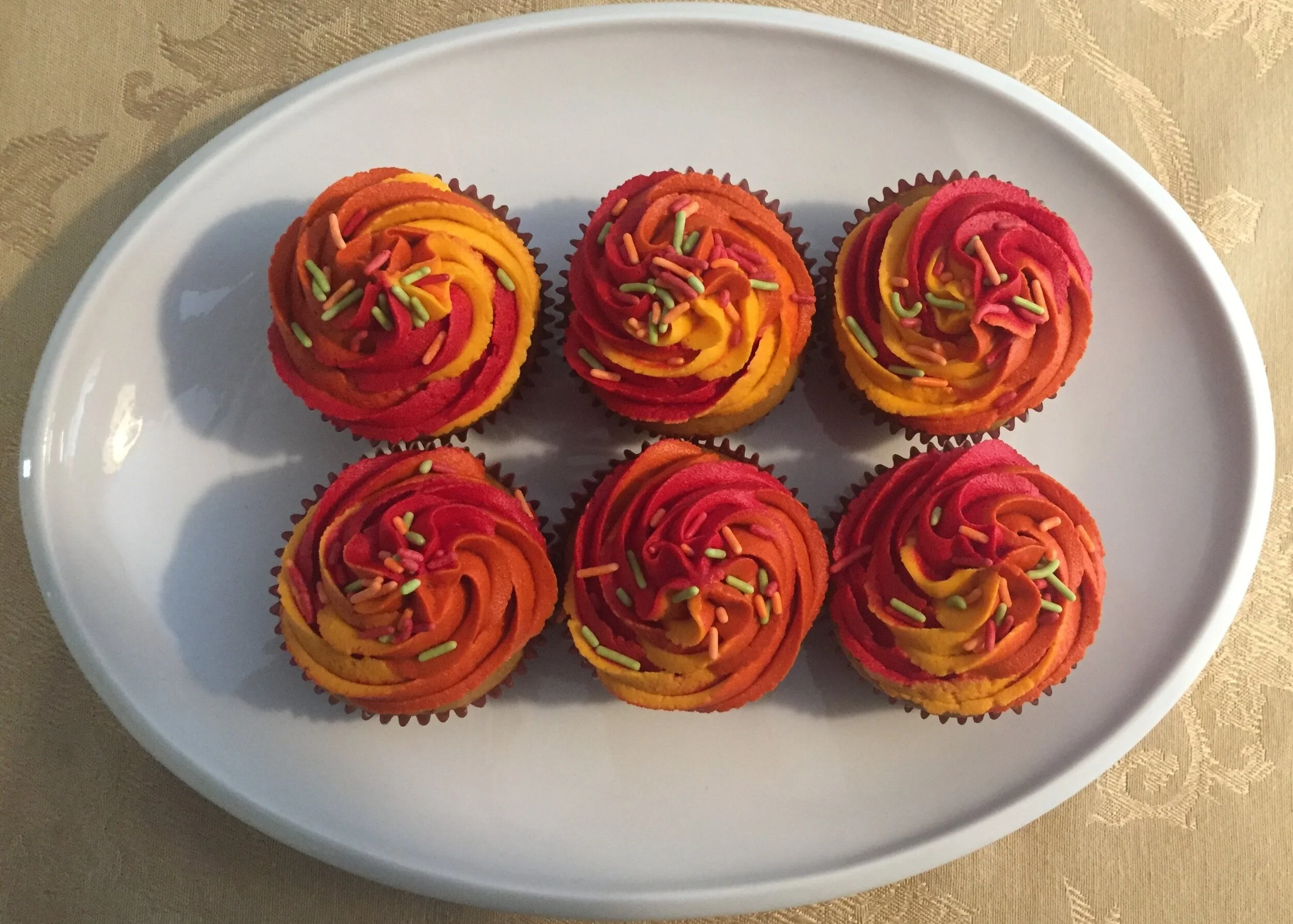 New pumpkin cupcakes - with all the colors of Fall swirled with Swiss buttercream.