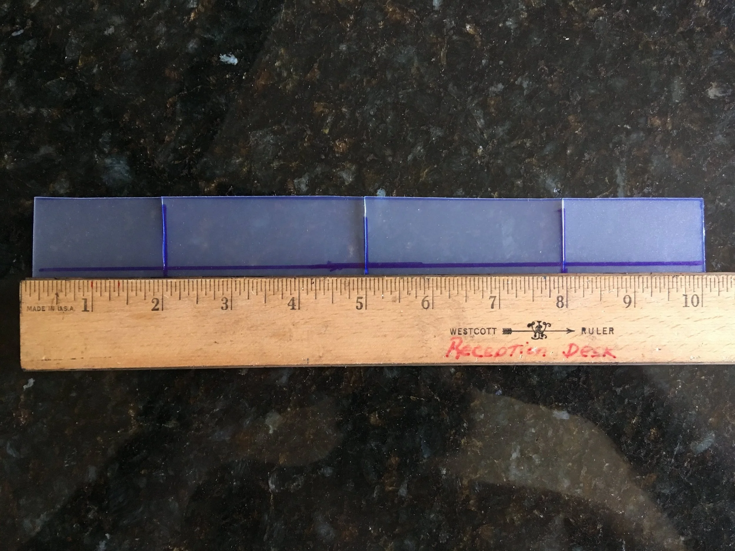 Cut notches at the 2", 5", and 8" marks on the two 10" pieces. (don't cut past the "halfway" point)