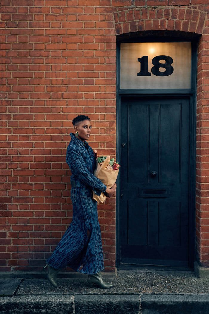 Christine Adams Hijack Season 2 photo by Ian Kobylanski LE MILE Magazine lemilestudios Christine Adams wears earrings by MAISON LUMIERE, a jacket and skirt by AHLUWALIA, and shoes by PLEIADES