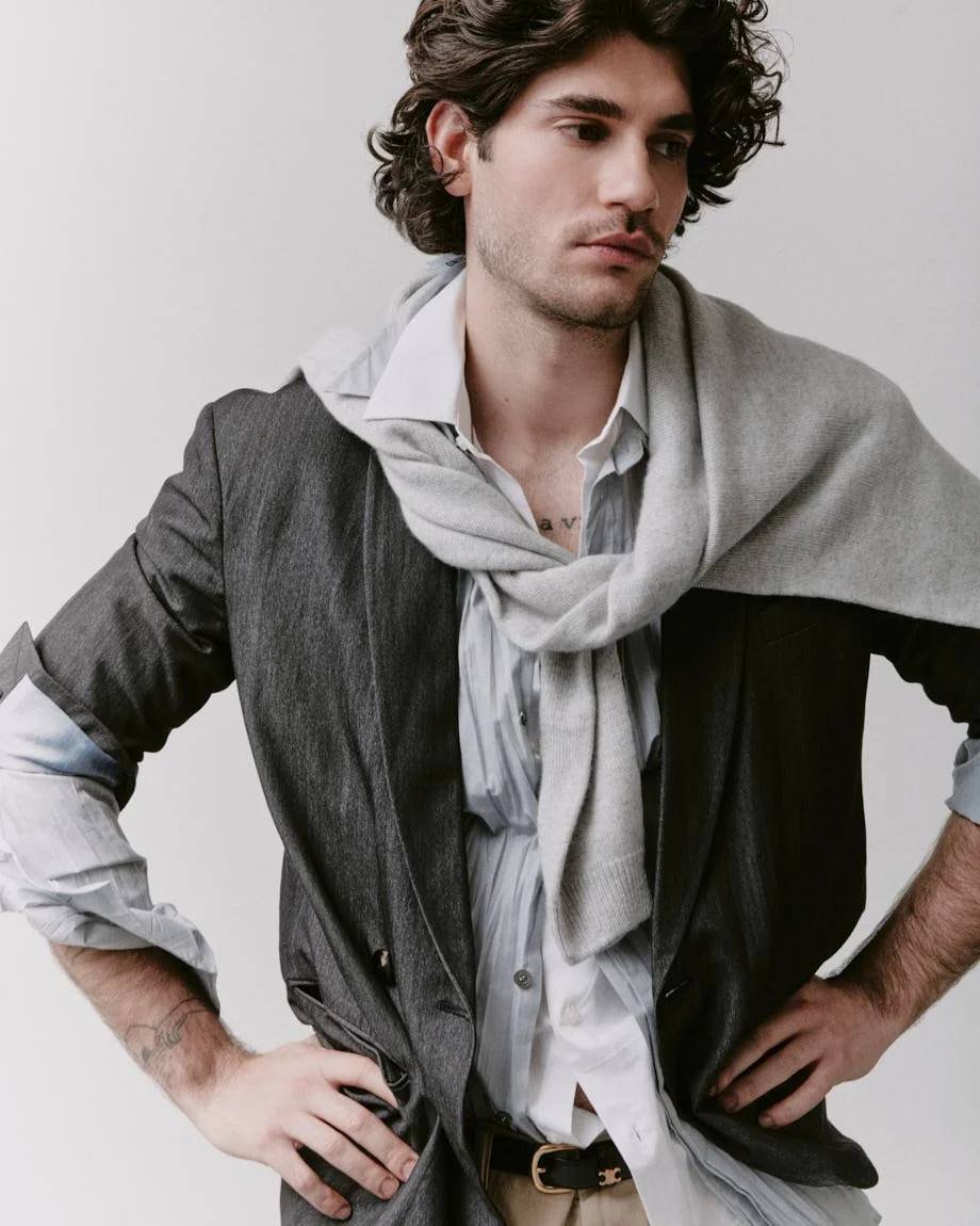 Michelangelo Vizzini photo by Andrea Cenetiempo for LE MILE Magazine CoverSS26 wearing a blazer by GIORGIO ARMANI, a sweater by SON OF A TAILOR, shirts by MOSCHINO and MICHAEL KORS, shorts by POLO RALPH LAUREN, shoes by CHURCH’S, and a belt by CELINE