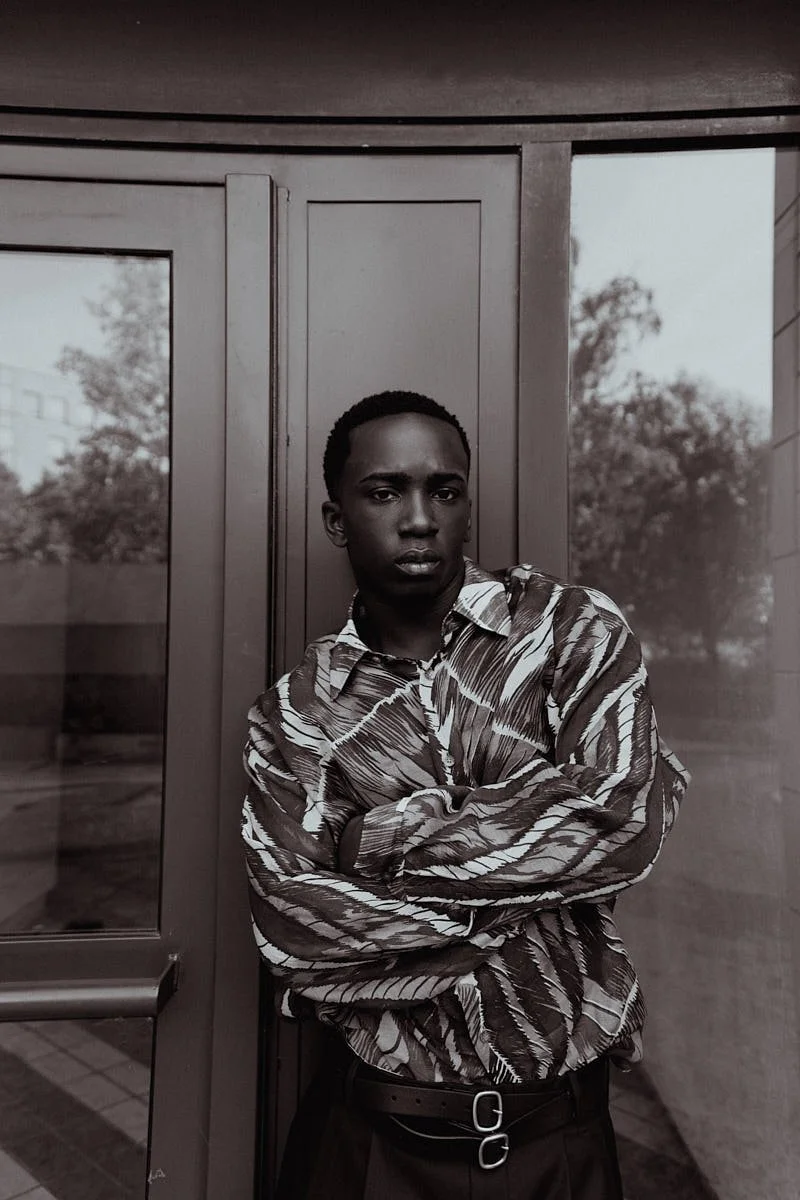 ARALOYIN OSHUNREMI for LE MILE Magazine Araloyin wears a shirt and shorts by VLISCO with a belt by HEREU STUDIO