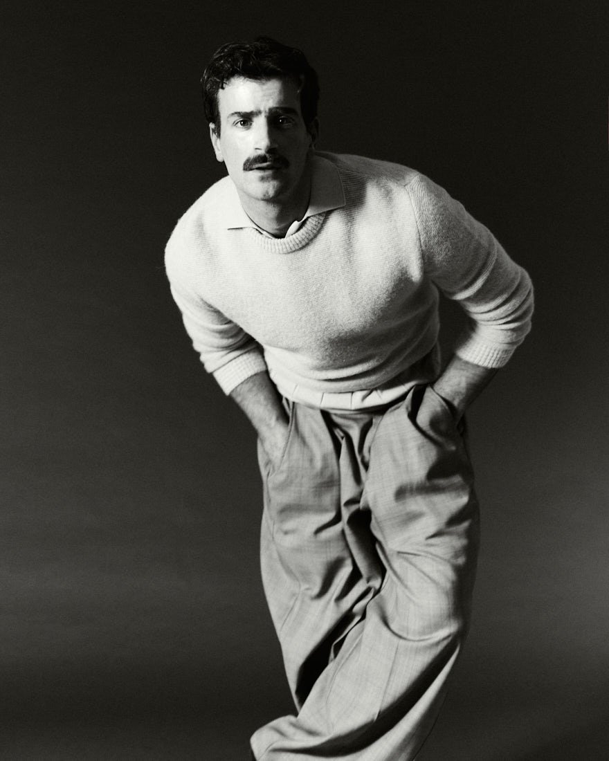 LE MILE MAGAZINE Giulio Ugolini podcast Dillo a Giulio photo by Cosimo Buccolieri Giulio wears a sweater by RANDOM IDENTITIES by Stefano Pilati, a T-shirt by MANUEL RITZ, and pants by HED MAYNER