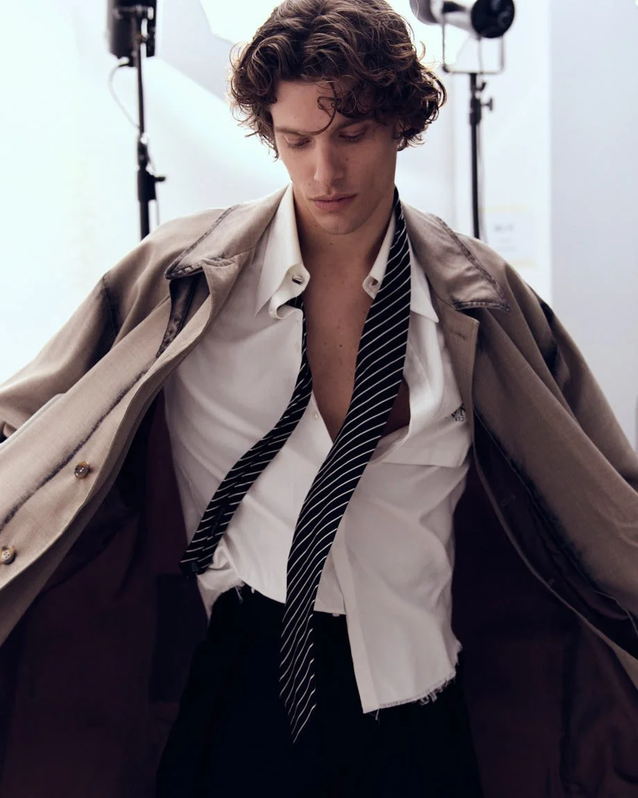 UMBERTO VILLAHERMOSA photo Cosimo Buccolieri Digital Cover SS26 for LE MILE Magazine Umberto wears a coat by ACT N1, a shirt by CANAKU, pants by THE NOUR, shoes by JIMMY CHOO, and an archive tie