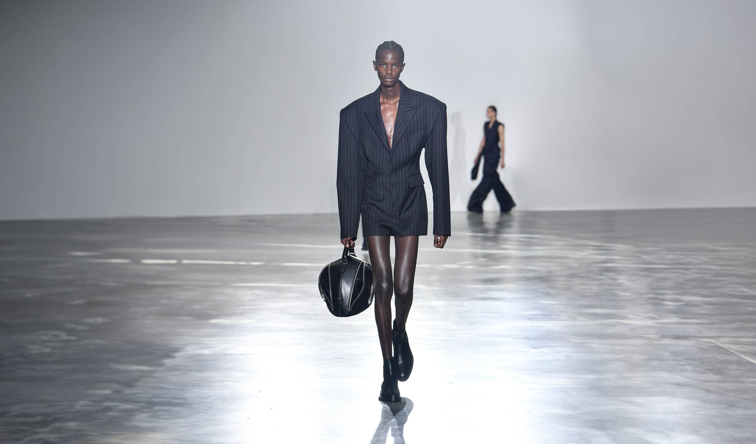 Men's Fashion Weeks Fall/Winter 2022-2023 explore the tension between  practical and ornamental 