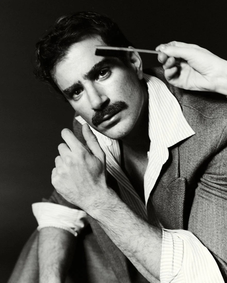 LE MILE MAGAZINE Giulio Ugolini podcast Dillo a Giulio photo by Cosimo Buccolieri Giulio wears a coat by TELA, a shirt by MICHAEL KORS, and shorts by THE LATEST