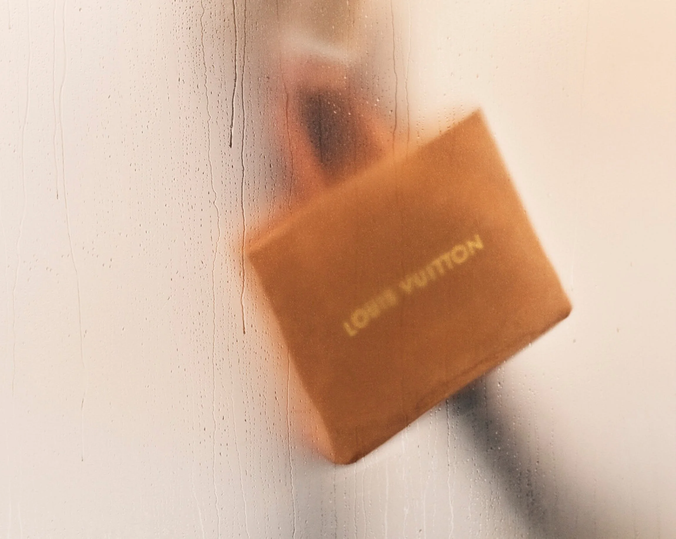 Pharrell Williams takes Louis Vuitton Out in the Rain