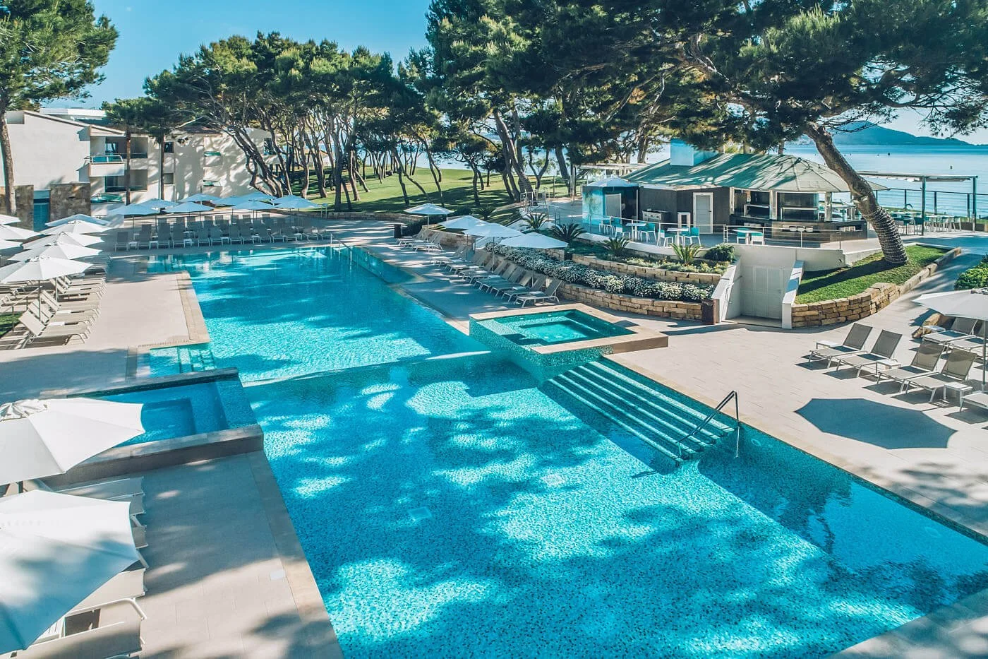 Iberostar Selection Playa de Muro Village reviewed by LE MILE Magazine for family trips to Mallorca Poolside