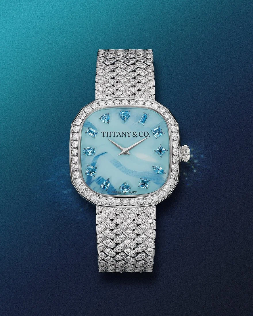 Eternity by Tiffany watch with a blue Venini Murano-glass dial, aquamarine hour markers and a diamond-set bracelet.