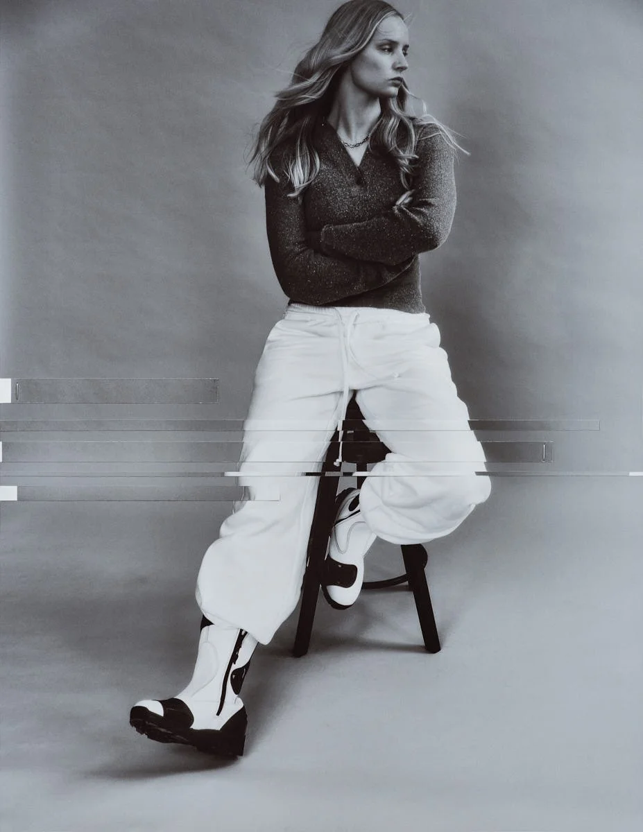 CHARLOTTE DAY WILSON LE MILE Magazine Digital Cover SS26 April Edition Charlotte wears a HELGA womens polo by CALVIN KLEIN COLLECTION, jogging pants by WANGDA, a necklace by GRISÉ, and Moto Boots 1.0 by SUNNI SUNNI