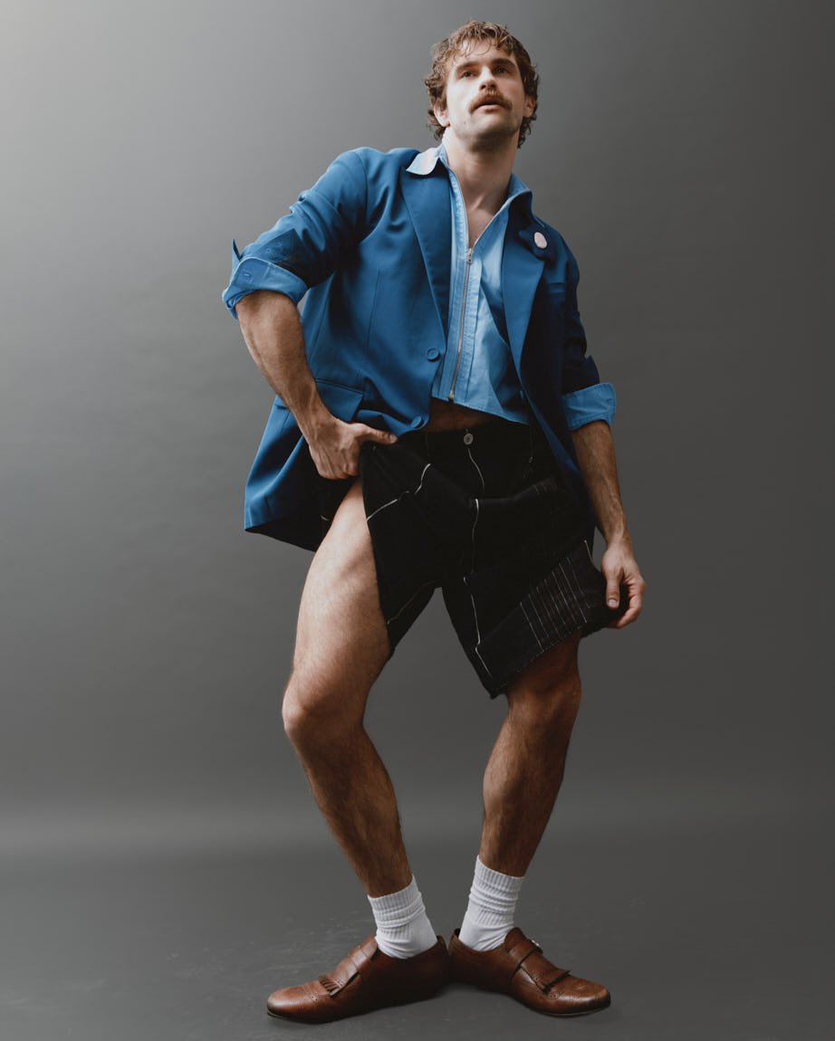 IVAN UGRIN for LE MILE Magazine photo by Andrea Cenetiempo SS26 Ivan wears a blazer by FENDI, shirt by SANDRO and shorts by PHYSIQUE DU ROLE