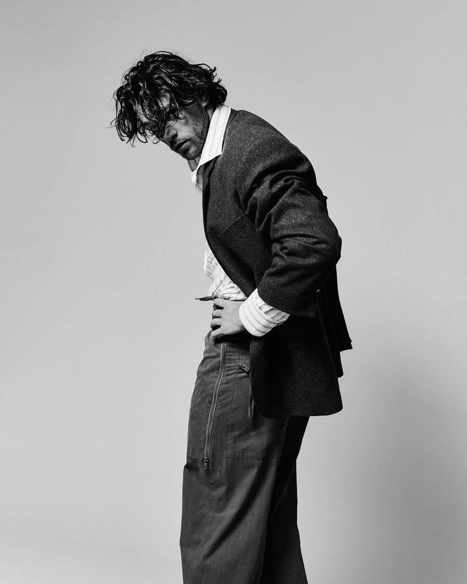SEBASTIANO PIGAZZI Actor Interview with LE MILE Magazine SS26 fashion digital cover Sebastiano wears a blazer by RANDOM IDENTITIES by Stefano Pilati, shirt by PAL ZILERI and pants by QUARTO ATTO