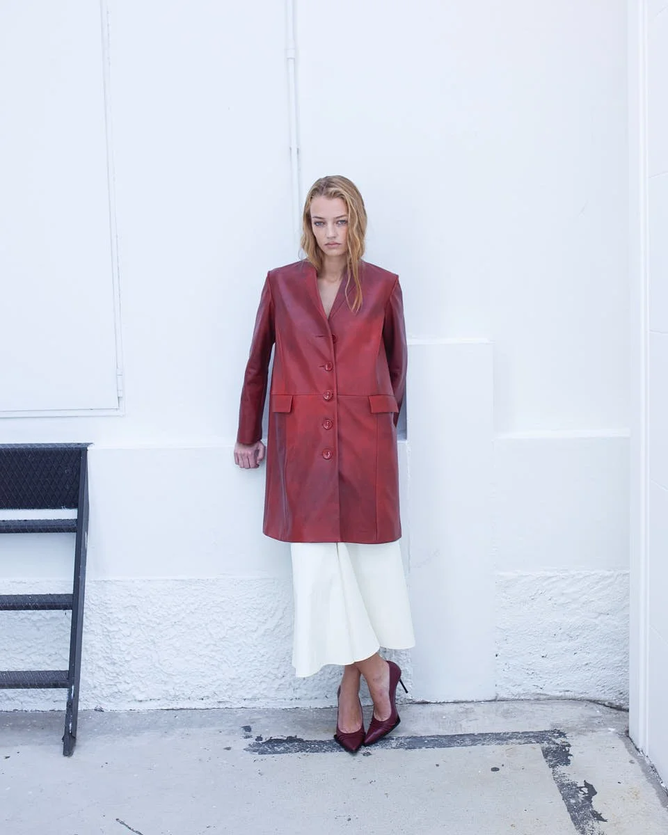 WHITE MILANO September 2026 edition model Elly Merkl photo by Matteo D’Agostino for LE MILE Magazine Elly wears a skirt and jacket by MISENITHE and shoes by MARCELL PUSTUL