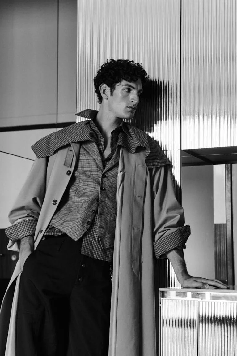 Aaron Shandel for LE MILE Magazine photographer Cosimo Buccolieri Issue 41 FW26 Deja Vu Cover Aaron wears a coat by CELINE, a vest by CARUSO, a shirt by MOSCHINO and pants by QUARTO ATTO