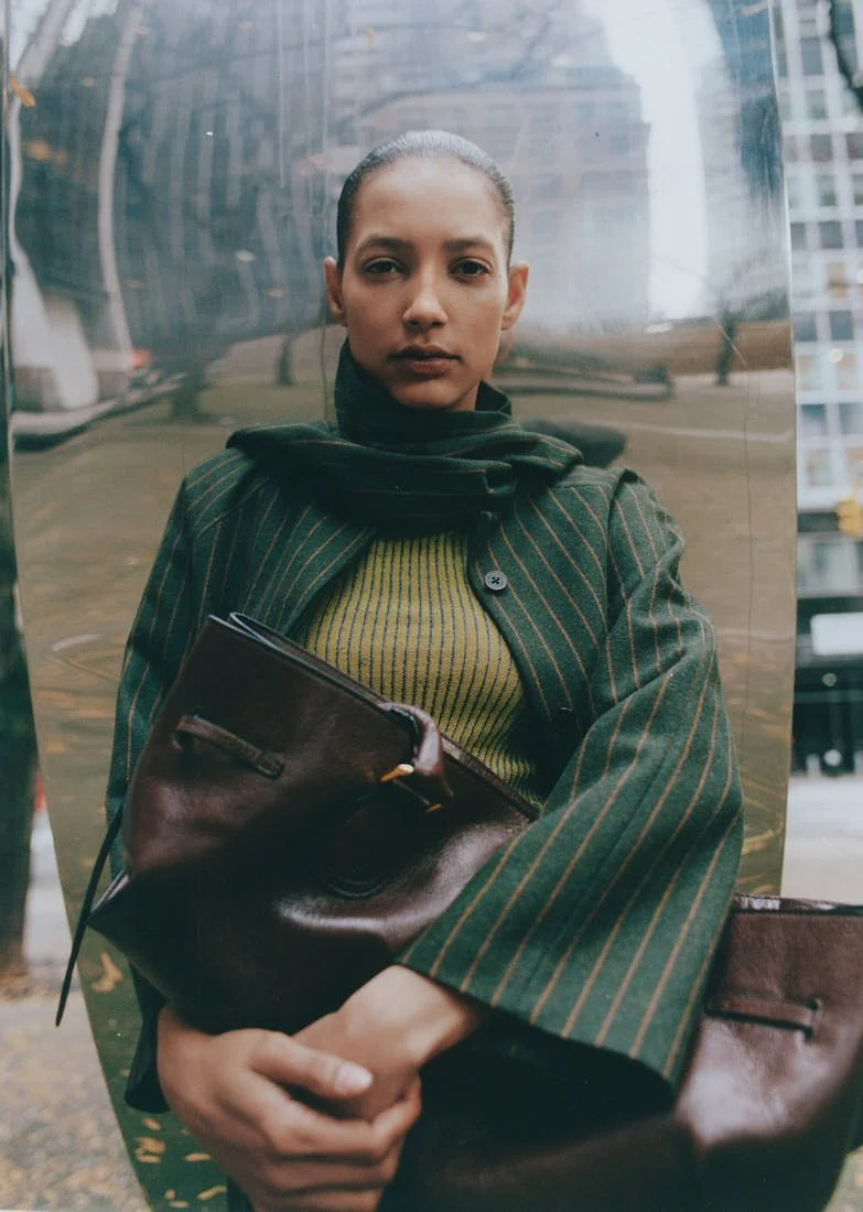 CHRIS SAULNIER LE MILE Magazine NYC WINTER BREATH FW25 Story Maria wears a dress by OOTO, a coat by Mola Walker, a bag by Radica Studio, and shoes by Femme Liberee.