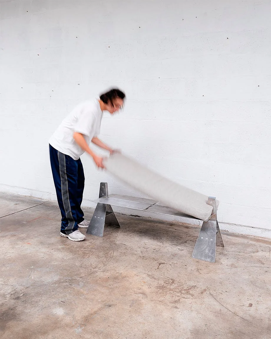 Industrial Designer Fashion Tom Ducarouge Interview Talk LE MILE Magazine Amel Bench reinterprets the classic Egyptian camel seat in an aluminum brutalist form secured with rivets, photographed by Charles Michalet.