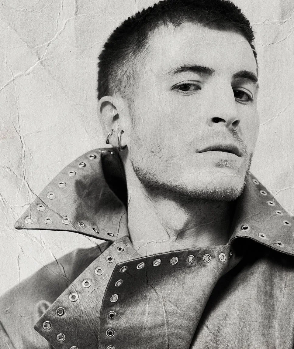 Kieron Moore LE MILE Magazine Cover Interview with Alban E. Smajli Kieron wears jacket and shorts by LUDOVIC DE SAINT SERNIN and ear cuffs by ALT PARIS