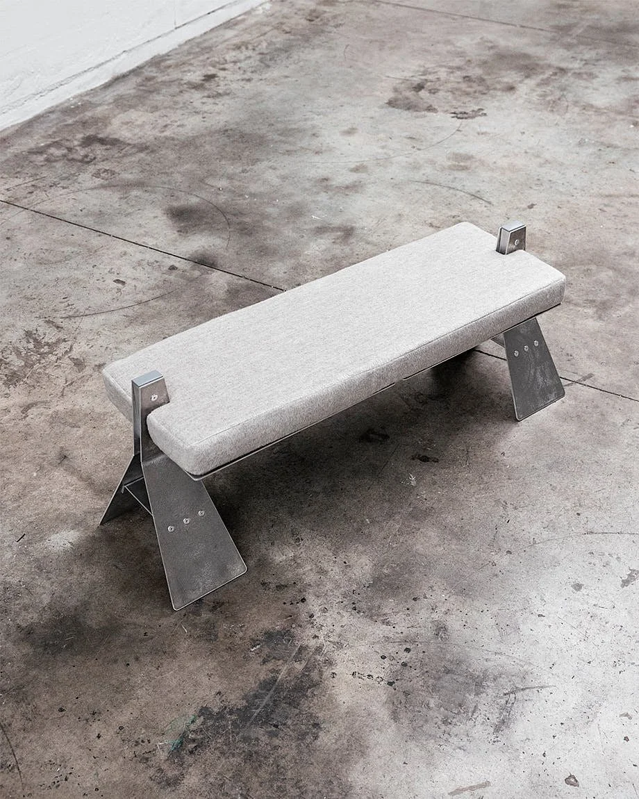 Industrial Designer Fashion Tom Ducarouge Interview Talk LE MILE Magazine Amel Bench reinterprets the classic Egyptian camel seat in an aluminum brutalist form secured with rivets, photographed by Charles Michalet.