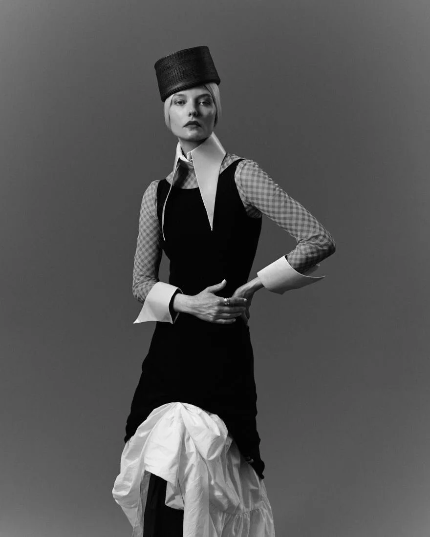 LE MILE Magazine ROOS ABELS Interview and SS26 Fashion Editorial Roos wears dresses by EXTREME CASHMERE and MICHAEL KORS, shirt by LOUIS VUITTON, shoes by MICHEL PIZA and hat by VIVETTA