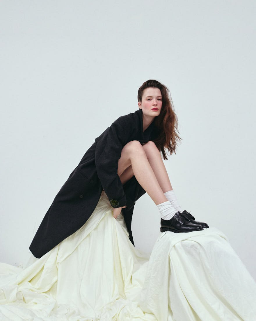 MADDIE STANLEY SS26 Editorial for LE MILE Magazine Maddie wears coat by MAREA and shoes by CHURCH'S