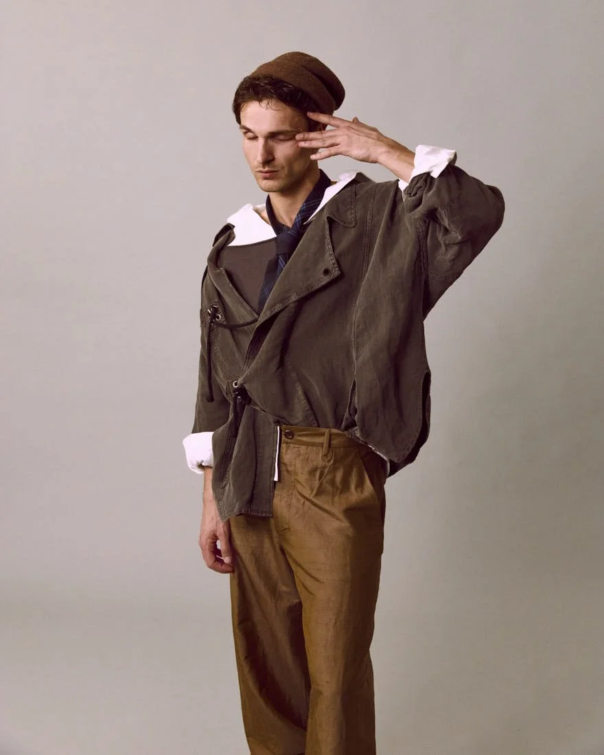 Mergim Shabani LE MILE Magazine DIGITAL COVER SS26 Mërgim wears a jacket by ISABEL MARANT, tank top by EXTREME CASHMERE, shirt by CANALI, pants by QUARTO ATTO, hat by LORO PIANA and tie by POLO RALPH LAUREN