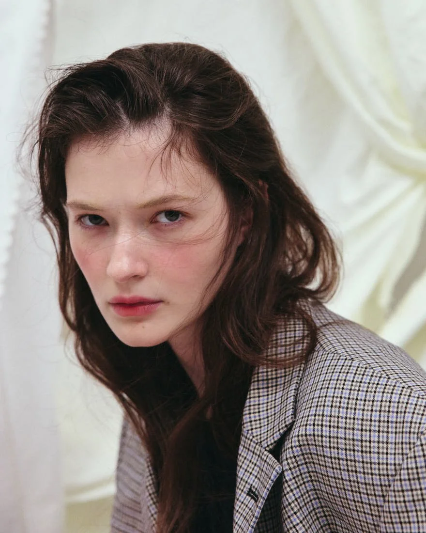 MADDIE STANLEY SS26 Editorial for LE MILE Magazine Maddie wears blazer by RANDOM IDENTITIES by Stefano Pilati, cardigan by MSGM