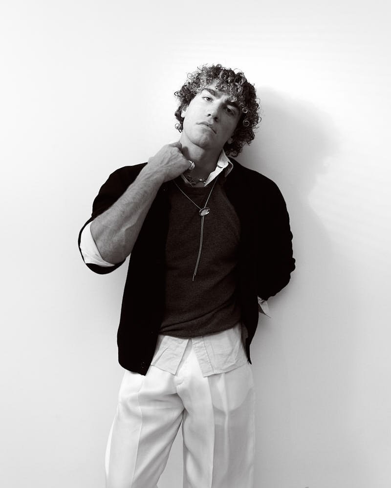 Simone Pollastri Digital Cover for LE MILE Magazine photo by Cosimo Buccolieri lemilestudios Simone wears a cardigan by NN.07, a sweater by EXTREME CASHMERE, a shirt by TOMMY HILFIGER, shorts by MOSCHINO, pants by CELINE, and jewellery by LAG WORLD