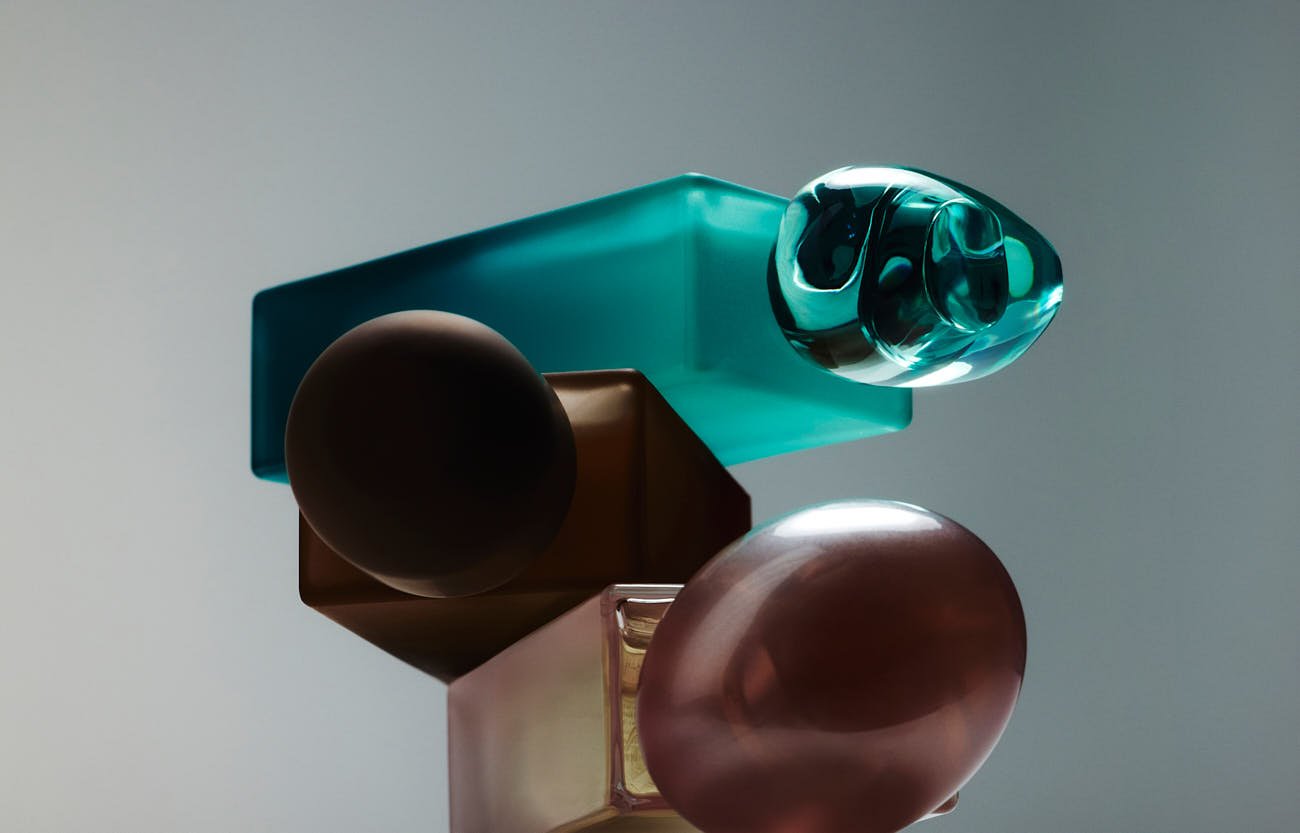 Eau de parfum bottles from the H&M and e.l.f. Cosmetics fragrance collaboration inspired by Power Grip, Halo Glow and Camo