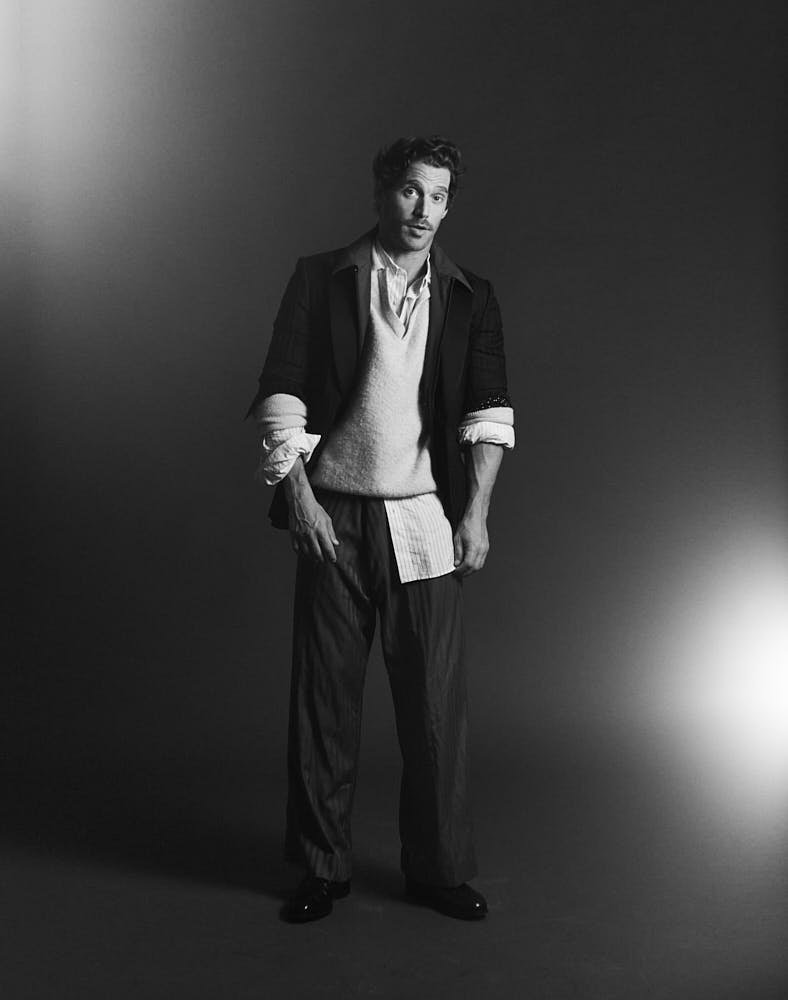 SIMONE BREDARIOL editorial FW25-26 lemilestudios LE MILE Magazine Simone wears a blazer by DOLCE & GABBANA, a jacket by CASCINELLI, a sweater by CALVIN KLEIN, a jumpsuit by HED MAYNER, and shoes by CHURCH’S