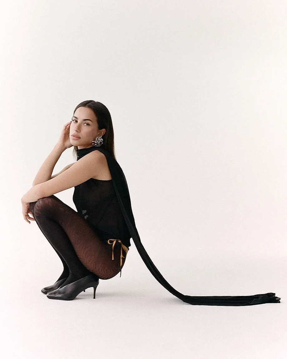 LE MILE Magazine Interview with Gizem Emre photographed by Nic Schoppet Gizem wears top, pants and jewelry by IOANNES, tights by FALKE and shoes by H&M Studio