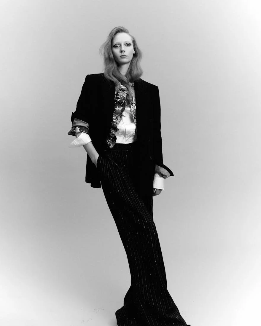 BRYDIE CLEVERINGA LE MILE Magazine SS26 Womenswear Editorial look Brydie wears blazers and pants by DOLCE&GABBANA, shirt by TAGLIATORE, shoes by APEPAZZA