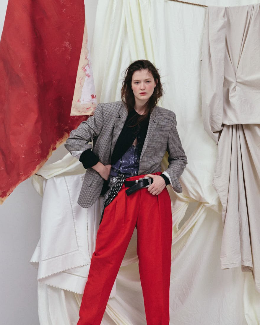 MADDIE STANLEY SS26 Editorial for LE MILE Magazine Maddie wears blazer by RANDOM IDENTITIES by Stefano Pilati, cardigan by MSGM, dress by BALESTRA, and pants and belt by VERSACE