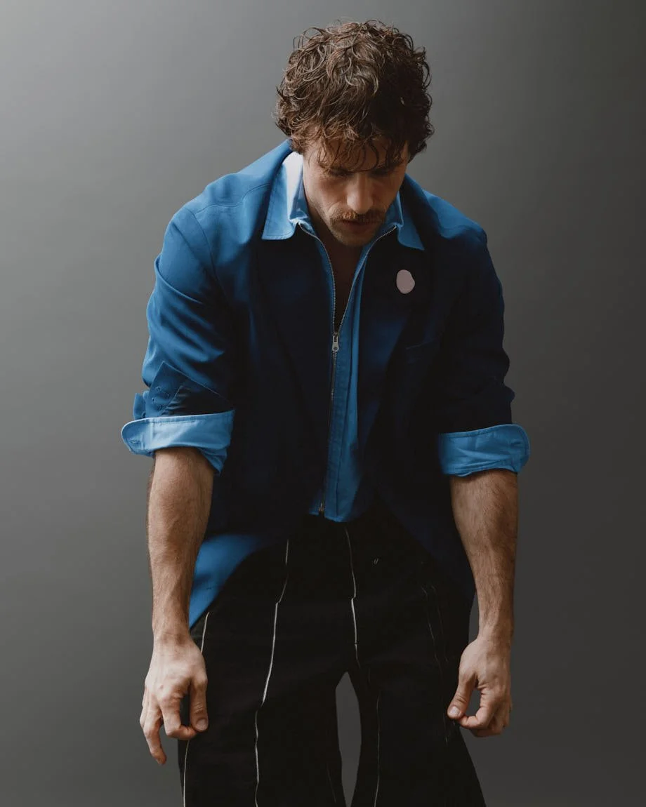 IVAN UGRIN for LE MILE Magazine photo by Andrea Cenetiempo SS26 Ivan wears a blazer by FENDI, shirt by SANDRO and shorts by PHYSIQUE DU ROLE