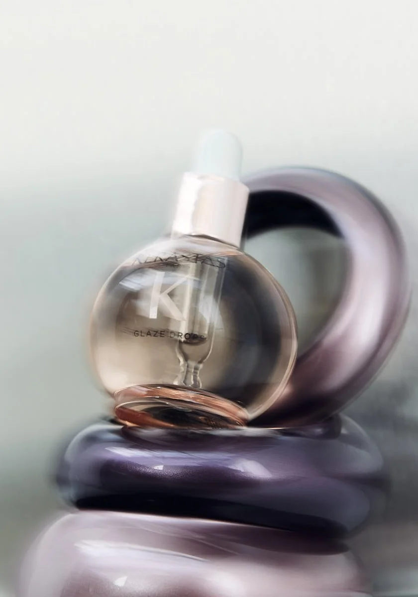 Glaze Drops by KÉRASTASE  Lightweight hydrating hair oil for radiant shine and a silky, frizz-free finish without weighing hair down.