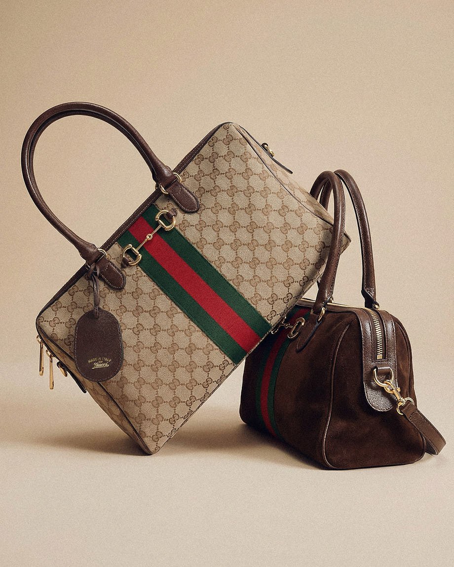 Two Gucci Borsetto bags, one in GG Monogram canvas and one in brown suede, shown with Horsebit hardware, green-red Gucci Web stripe, leather handles and detachable strap