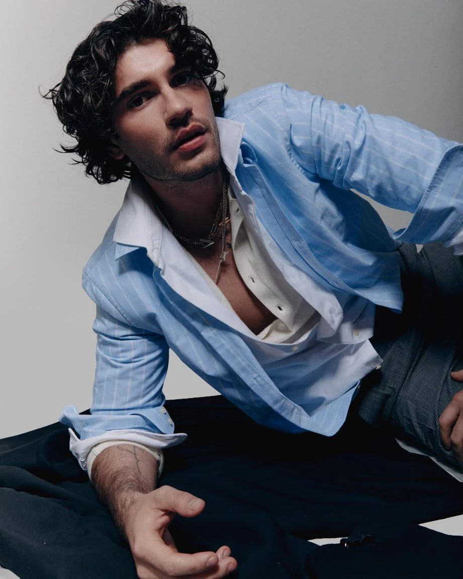 Michelangelo Vizzini photo by Andrea Cenetiempo for LE MILE Magazine CoverSS26 wearing shirts by SON OF A TAILOR and POLO RALPH LAUREN, pants by MOSCHINO, shoes by CHURCH’S, and jewellery by LAG WORLD