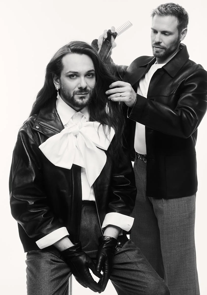Florian Ferino styling Riccardo Simonetti's long hair for their Kérastase feature in LE MILE Magazine, exploring the artistry behind his signature look.