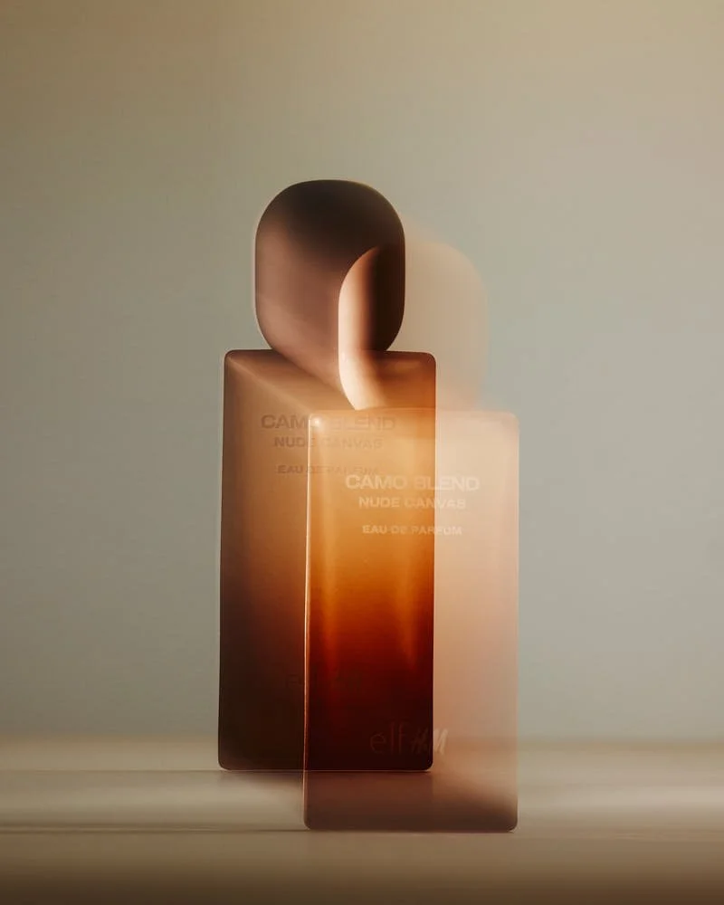 Eau de parfum bottles from the H&M and e.l.f. Cosmetics fragrance collaboration inspired by Power Grip, Halo Glow and Camo