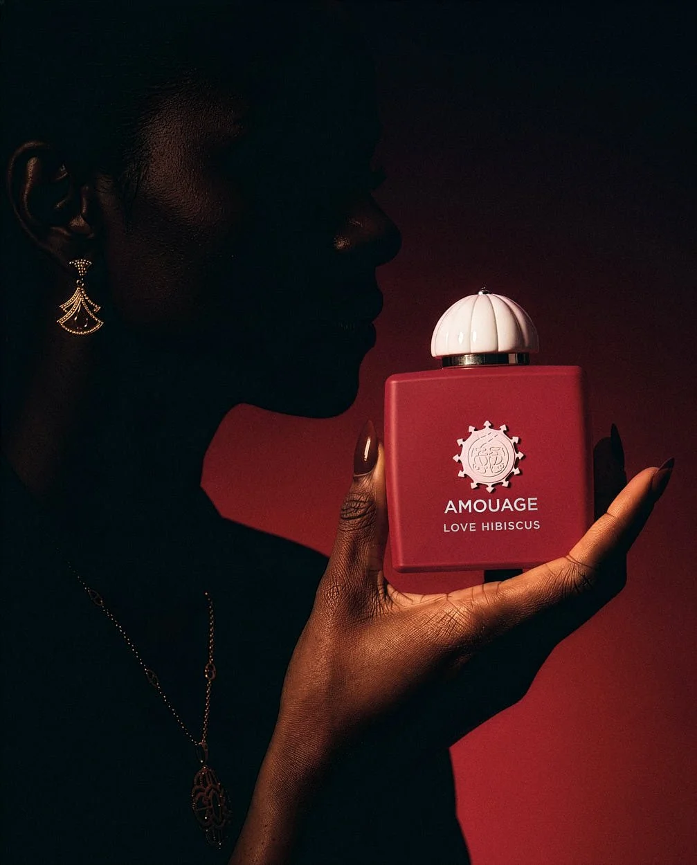 AMOUAGE Love Hibiscus perfume  model holding flacon featured by LE MILE Magazine