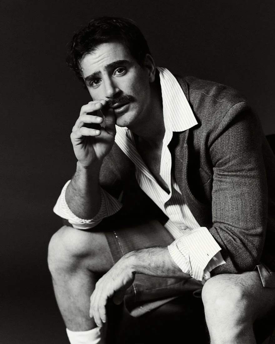 LE MILE MAGAZINE Giulio Ugolini podcast Dillo a Giulio photo by Cosimo Buccolieri Giulio wears a coat by TELA, a shirt by MICHAEL KORS, and shorts by THE LATEST