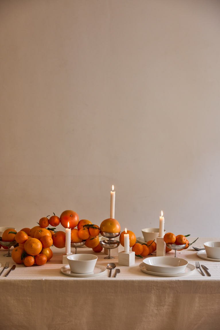 onomao Pura collection in White with white GMK x onomao candle holders in a long table setting, LE MILE Magazine.