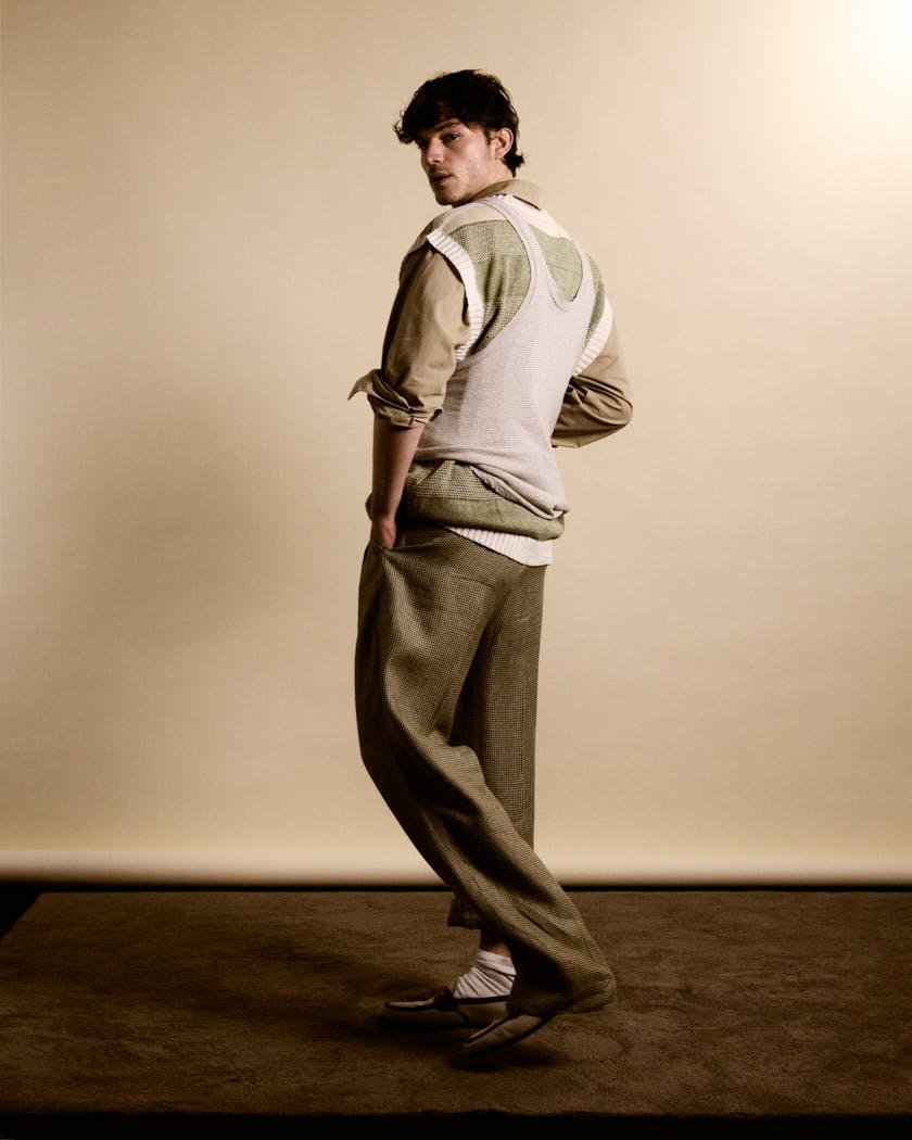 MATTEO GUERRIERI LE MILE Magazine Digital Cover SS26 Menswear Matteo wears a tank top by ISABEL MARANT, a vest by LUCA LARENZA, a shirt by LABO.ART, pants by ZEGNA, and shoes by CHURCH’S