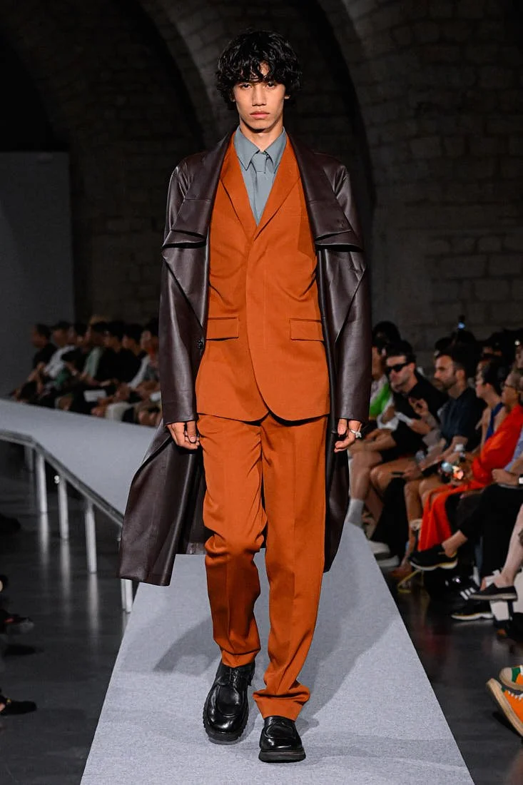 TAAKK SS27 Paris Fashion Week Review LE MILE Magazine orange suit and black leather coat
